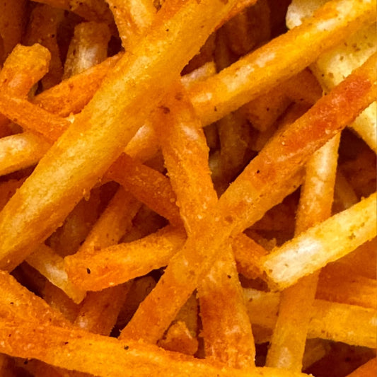 Close-up of orange-colored snack sticks