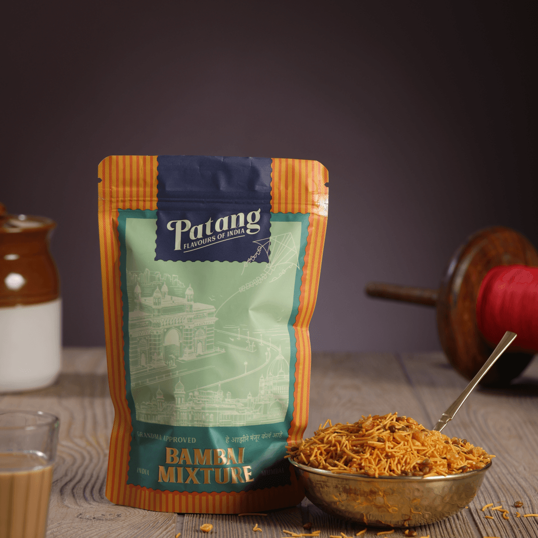 Packaged Bambu Mixture with Patang branding on a wooden surface.