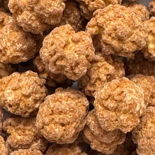 Close up of crunchy roasted chana coated in pure natural jaggery, a healthy alternative to refined sugar sweets