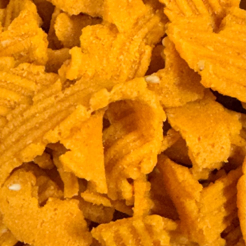 Close up of crunchy Sattur Seeval showing textured ribbons of spicy gram flour, also called ribbon murukku