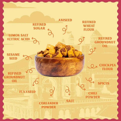 Natural ingredients of traditional Puneri Bhakarwadi snack featuring whole spices, sesame seeds, and pure groundnut oil