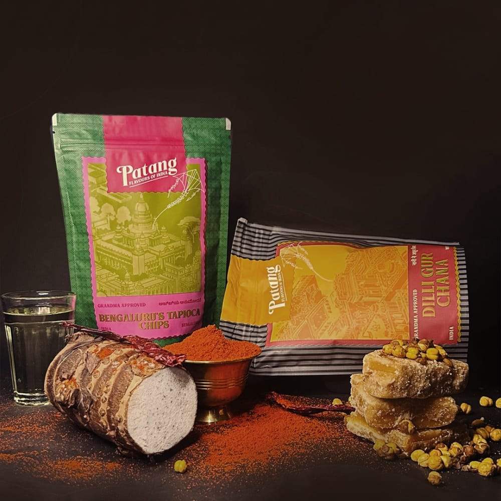 Patang brand products including Bengaluru Tapoca Chips and Dilligir Chana on a dark background